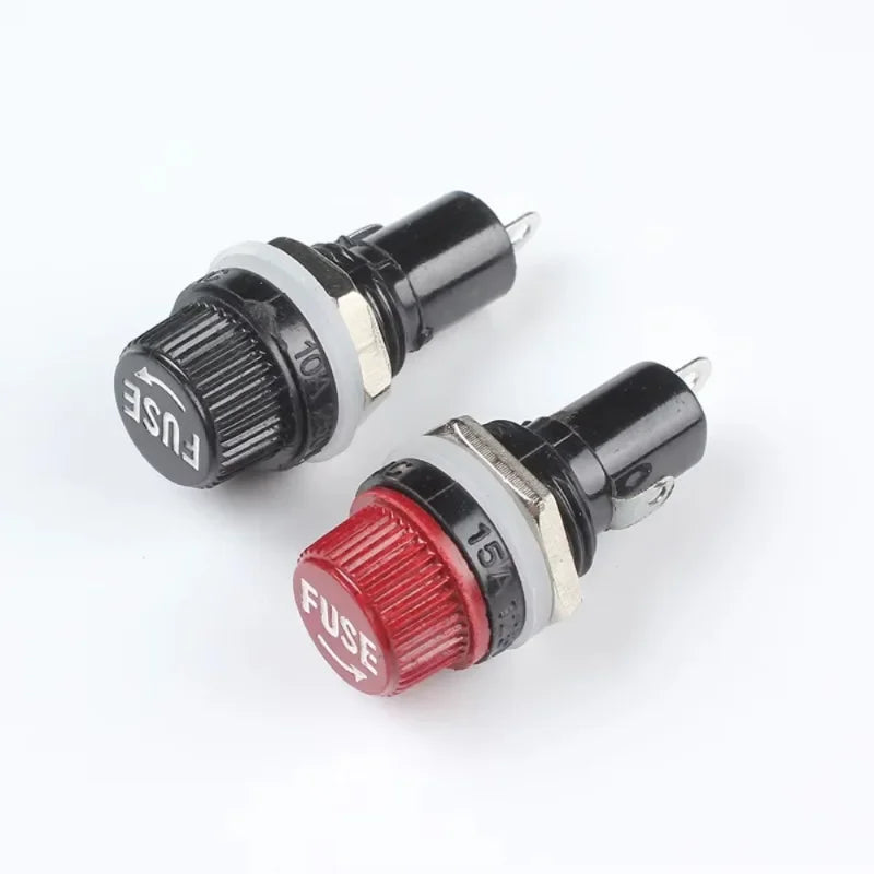 Two fuse indicators with black and red labels on a white background
