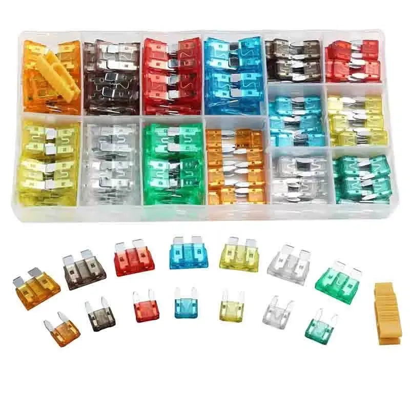 Assorted colored plug in fuses in a clear plastic case with visible fuse ratings. RH100 Multicolored 2a 3a 5a 7.5a 10a 15a 20a 25a 30a 35 amp